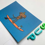 Front detail from paddle boarding dog birthday postcard