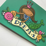 Front detail of brown haired mermaid dream postcard from 72 Bumblebee Lane