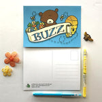Front and back views of buzz honey bear postcard from 72 Bumblebee Lane 