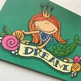 Front detail of red-haired mermaid dream postcard from 72 Bumblebee Lane