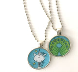Unicorn and Mermaid original illustration necklaces on ball chain. Antiqued silver finish on pendant bezel. Image sealed under epoxy.